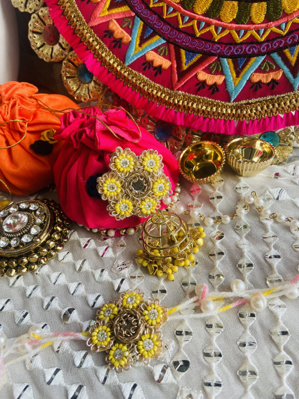 Yellow embroidered Rakhi Set